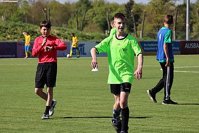 Spieler auf Fußballplatz